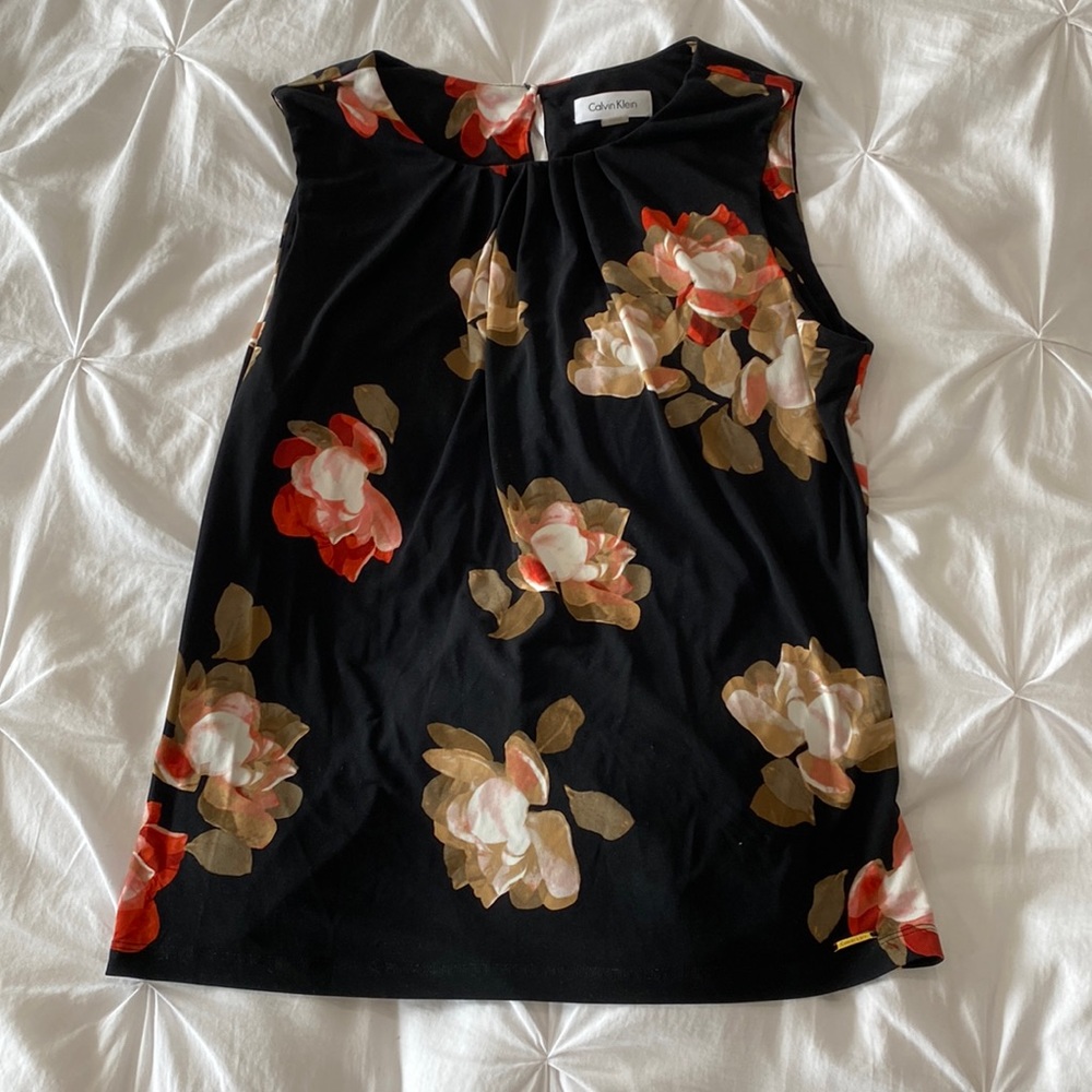 Calvin Klein black flowery sleeveless top.